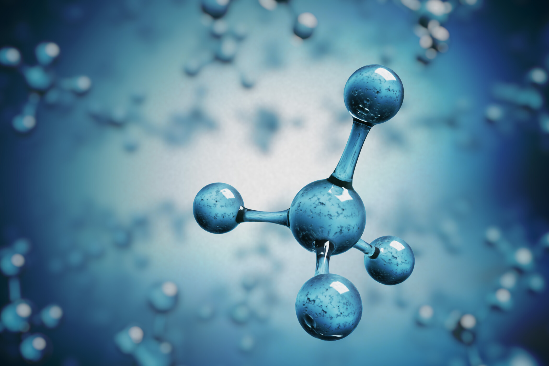 Bioethanolmolekül Ein großes blaues Bioethanolmolekül schwebt frei zwischen vielen kleinen Molekülen